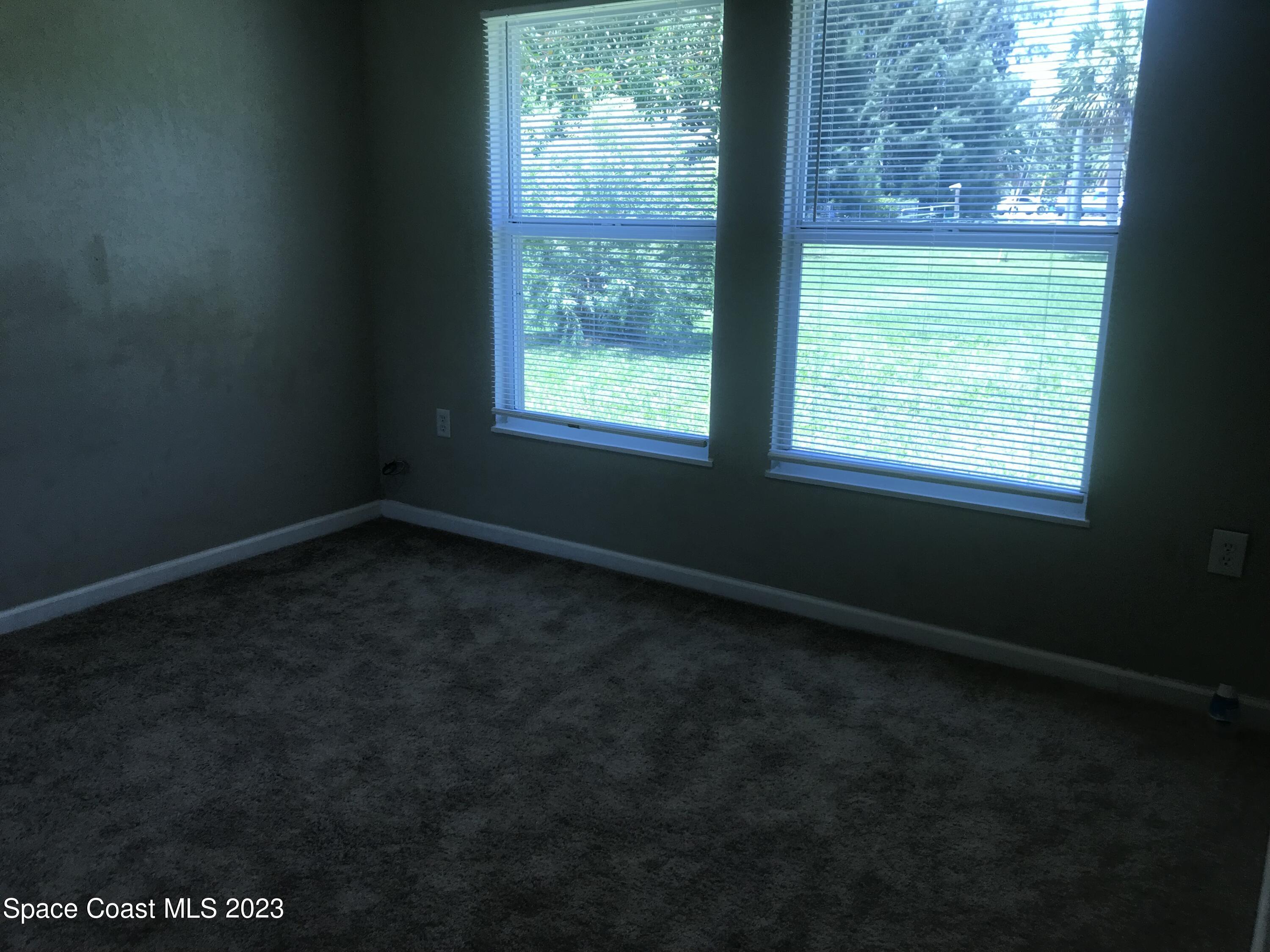2525 Malabar Road Malabar, FL 32950 - Photo 16 of 30 a view of an empty room with a window