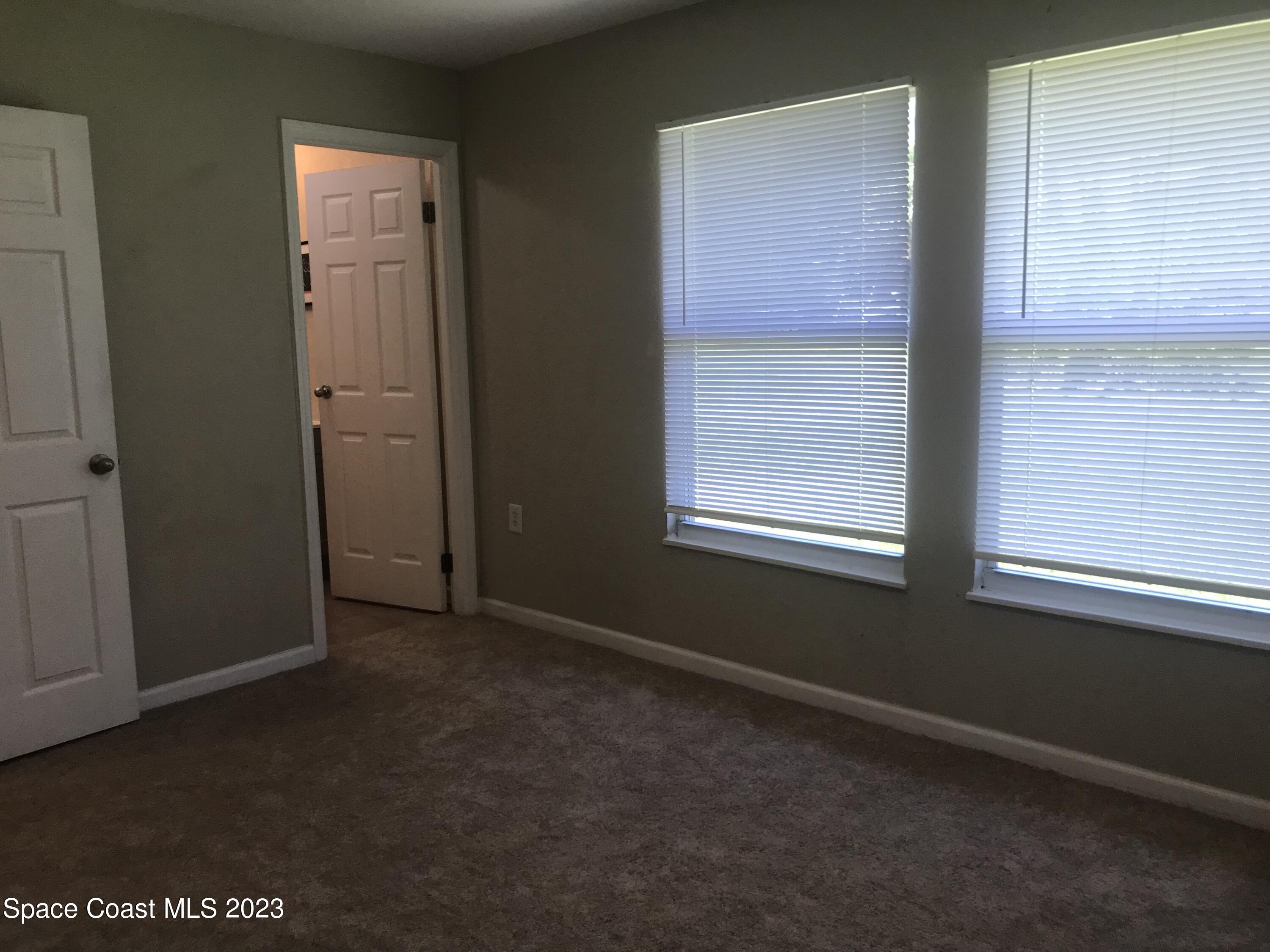 2525 Malabar Road Malabar, FL 32950 - Photo 17 of 30 an empty room that has a window