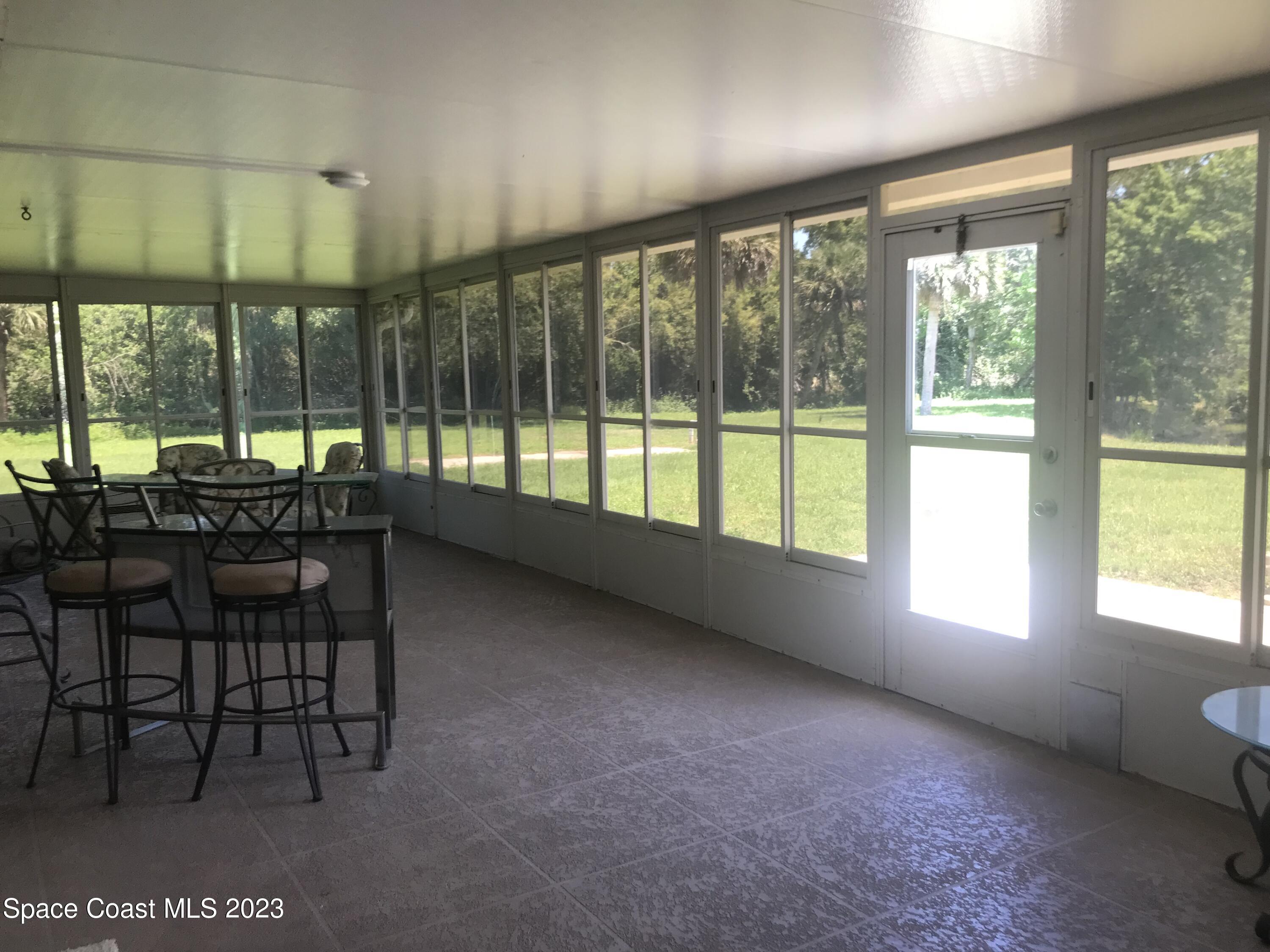 2525 Malabar Road Malabar, FL 32950 - Photo 19 of 30 a view of work space with windows