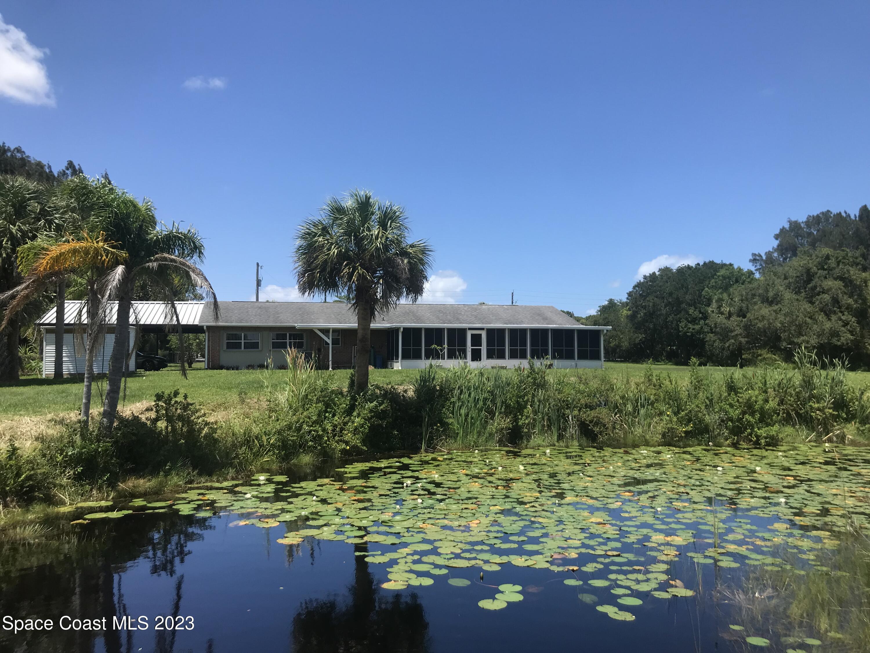 2525 Malabar Road Malabar, FL 32950 - Photo 30 of 30 a view of a garden
