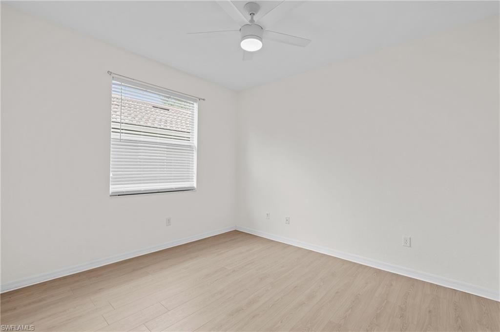 1905 Par Drive Naples, FL 34120 - Photo 17 of 30 an empty room with a window