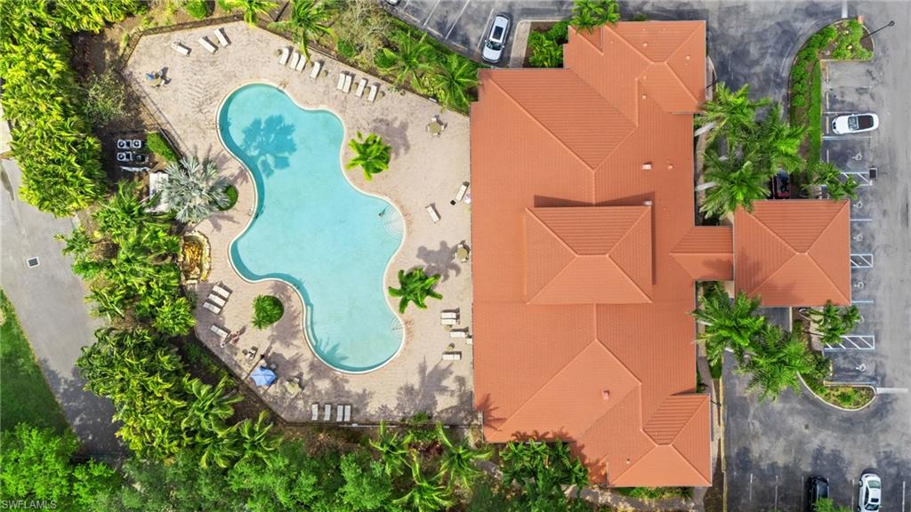 1905 Par Drive Naples, FL 34120 - Photo 28 of 30 an aerial view of a swimming pool