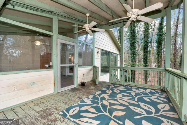 a bedroom with a bed and a view of bathroom