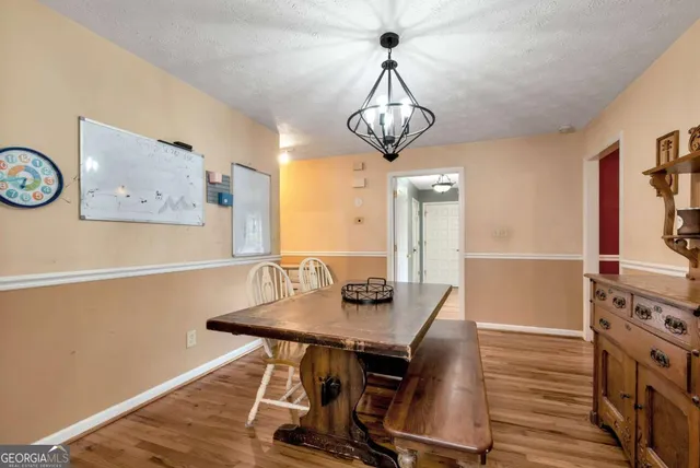 a living room with a couch and a flat screen tv