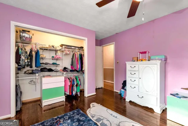 a bathroom with a sink a toilet and vanity