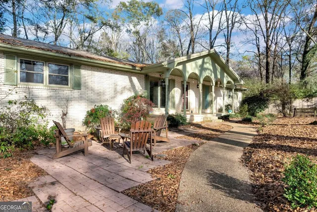 a backyard of a house with lots of green space
