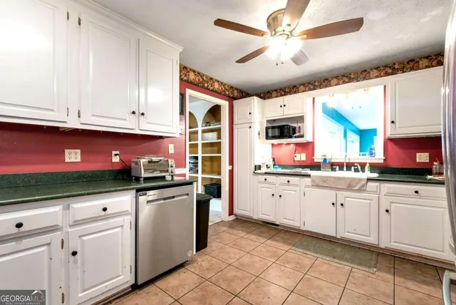 a bed room with furniture and a window