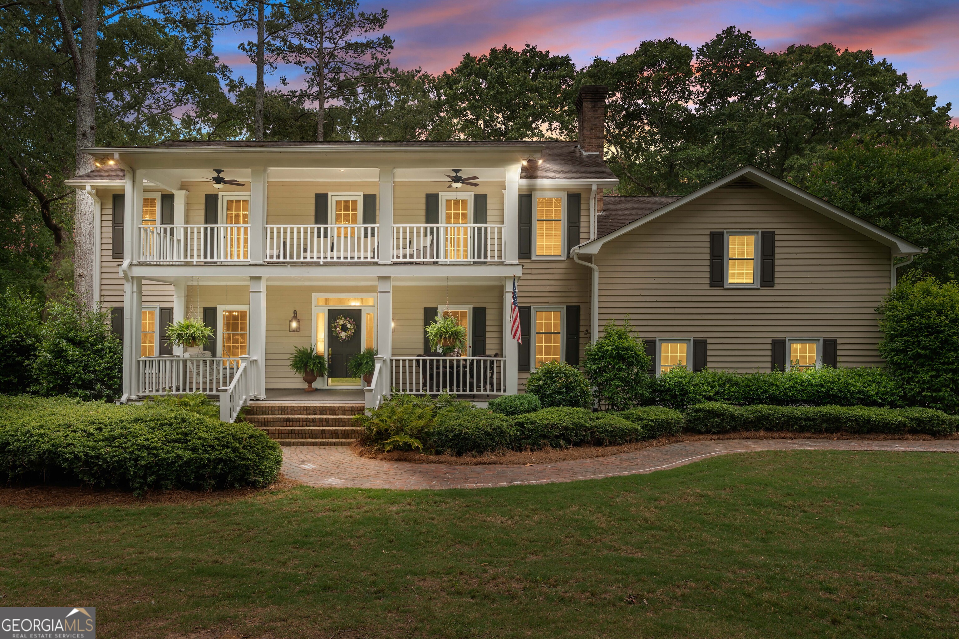 836 Oak Grove Road Carrollton, GA 30117 - Photo 1 of 50 a front view of a house with garden
