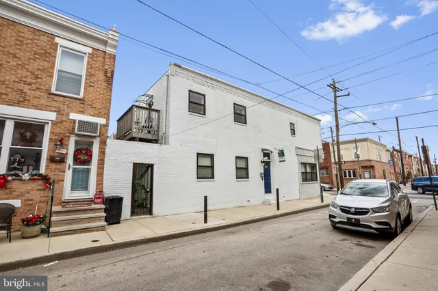 a car parked in front of a building