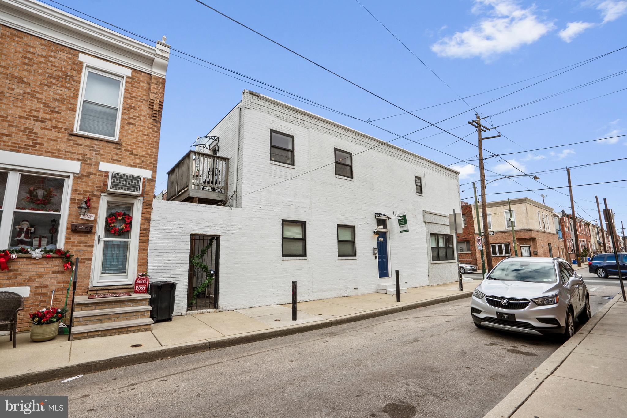 2024 South 12th Street, Unit 2 Philadelphia, PA 19148 - Photo 21 of 21 a car parked in front of a building