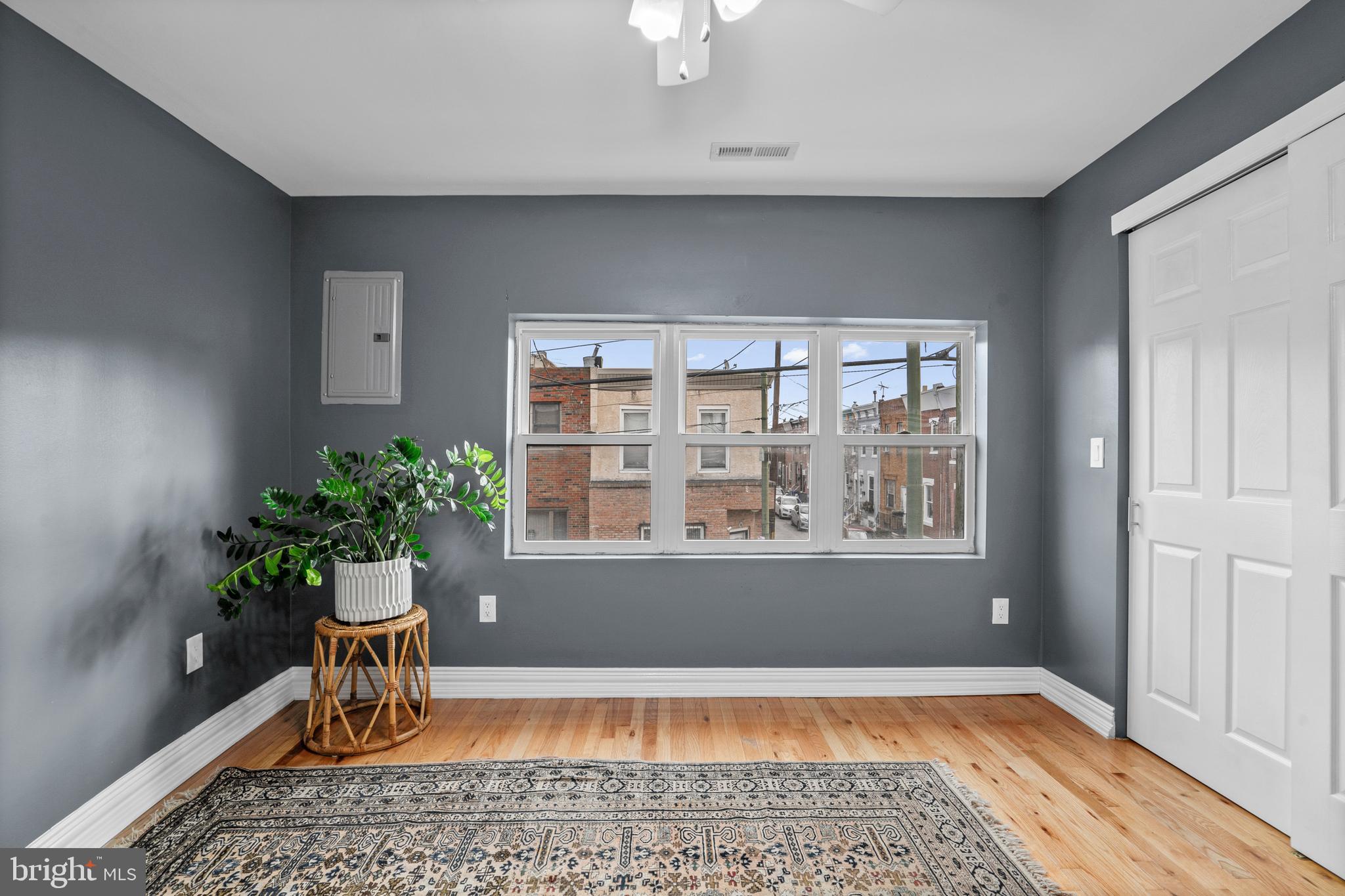 2024 South 12th Street, Unit 2 Philadelphia, PA 19148 - Photo 6 of 21 a living room with a potted plant and a table