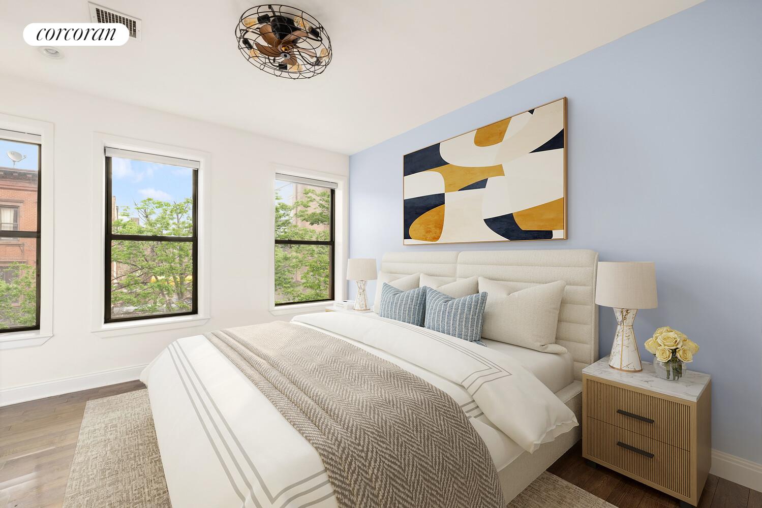 320 Macon Street, Unit 3 Brooklyn, NY 11216 - Photo 6 of 11 a bedroom with a bed and painting on the wall