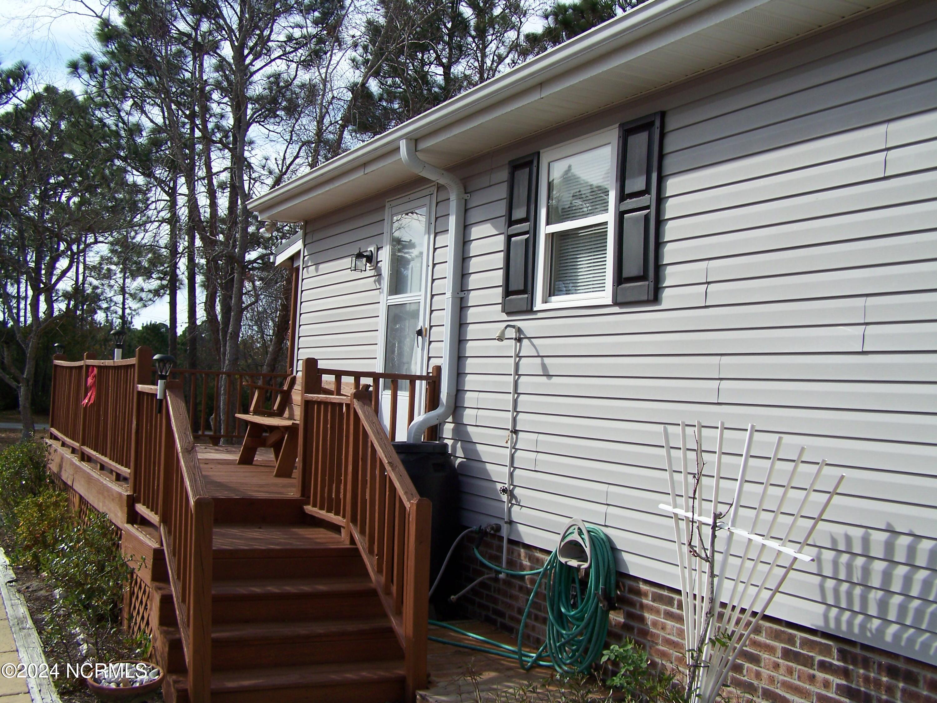 36 North Lake Drive Boiling Spring Lakes, NC 28461 - Photo 33 of 55 Right side of home
