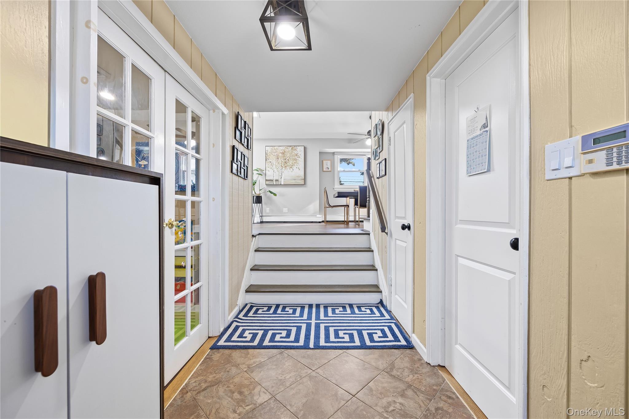 38 Oxford Road Old Bethpage, NY 11804 - Photo 11 of 23 a view of an entryway with staircase