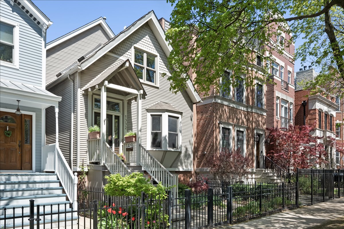 1332 West School Street Chicago, IL 60657 - Photo 2 of 45 a front view of a house with garden
