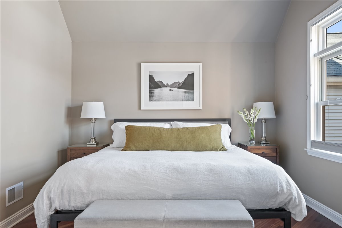 1332 West School Street Chicago, IL 60657 - Photo 23 of 45 a bedroom with a bed and a window
