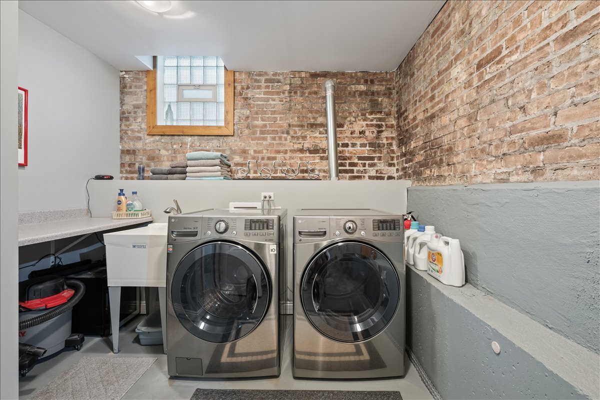 1332 West School Street Chicago, IL 60657 - Photo 37 of 45 a utility room with closet dryer and washer