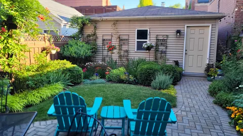 a view of a chair and table in the patio