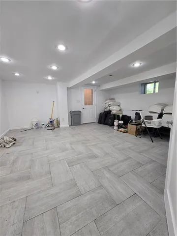 a bathroom with a sink toilet and a mirror