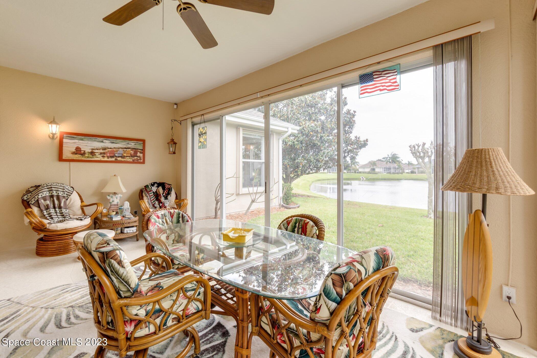 4370 Aberdeen Circle Rockledge, FL 32955 - Photo 3 of 58 a view of a dining room with furniture window and outside view