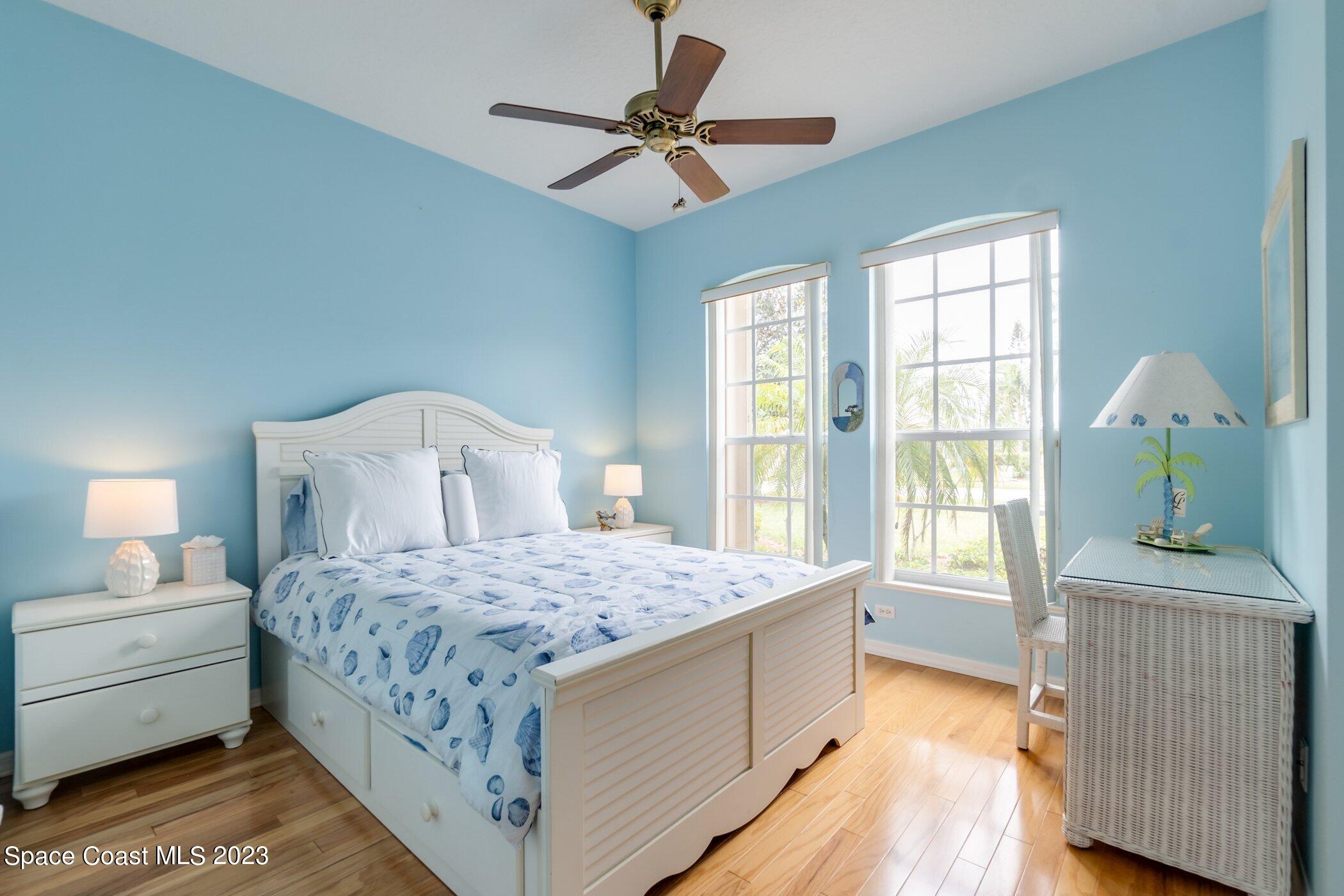 4370 Aberdeen Circle Rockledge, FL 32955 - Photo 34 of 58 a bedroom with a bed and a table