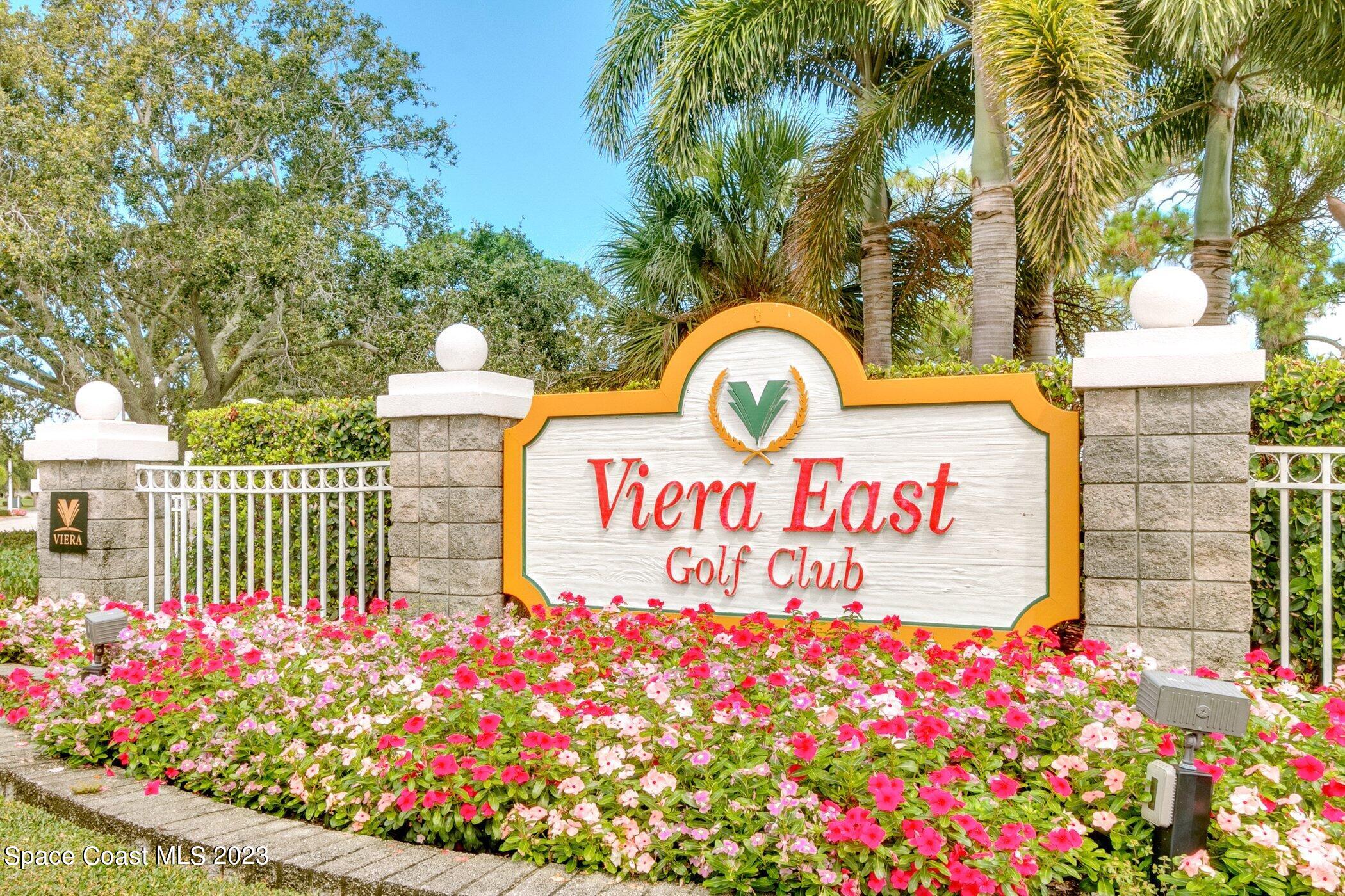4370 Aberdeen Circle Rockledge, FL 32955 - Photo 54 of 58 a sign that is in front of flowers
