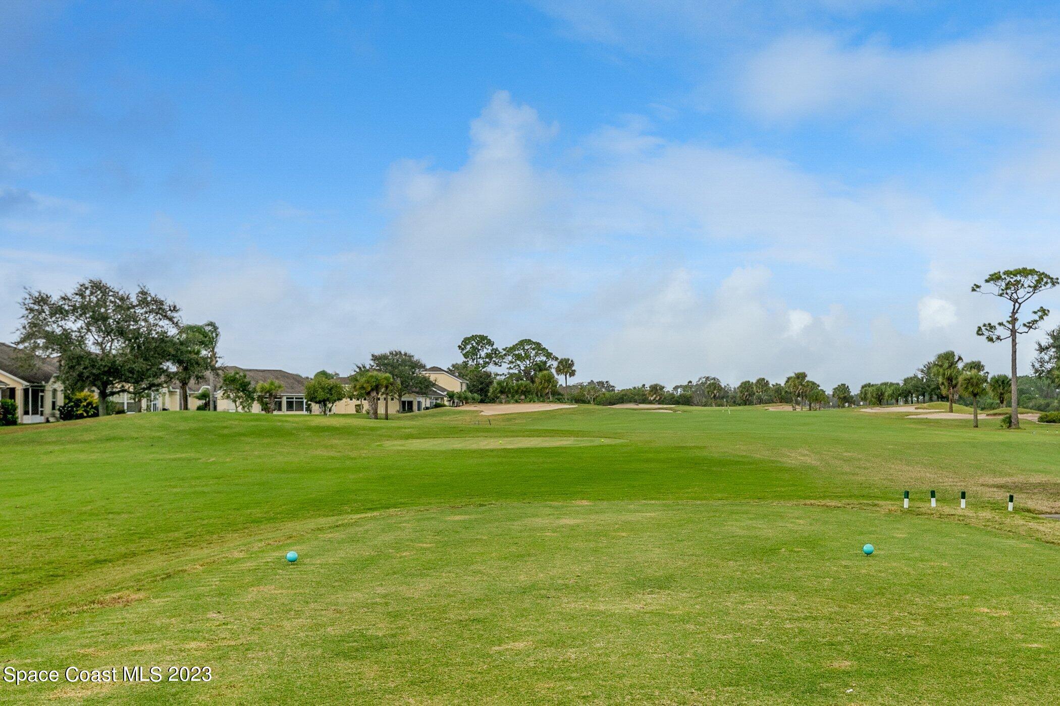 4370 Aberdeen Circle Rockledge, FL 32955 - Photo 58 of 58 a view of a golf course with a lake