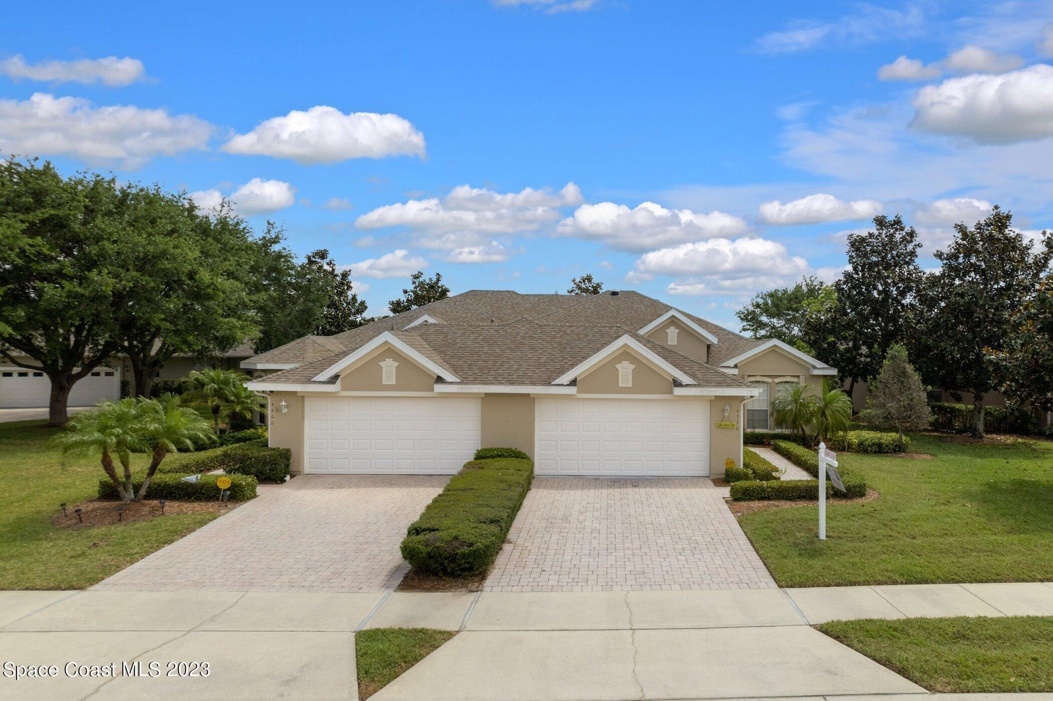 4370 Aberdeen Circle Rockledge, FL 32955 - Photo 6 of 58 a front view of a house with garden