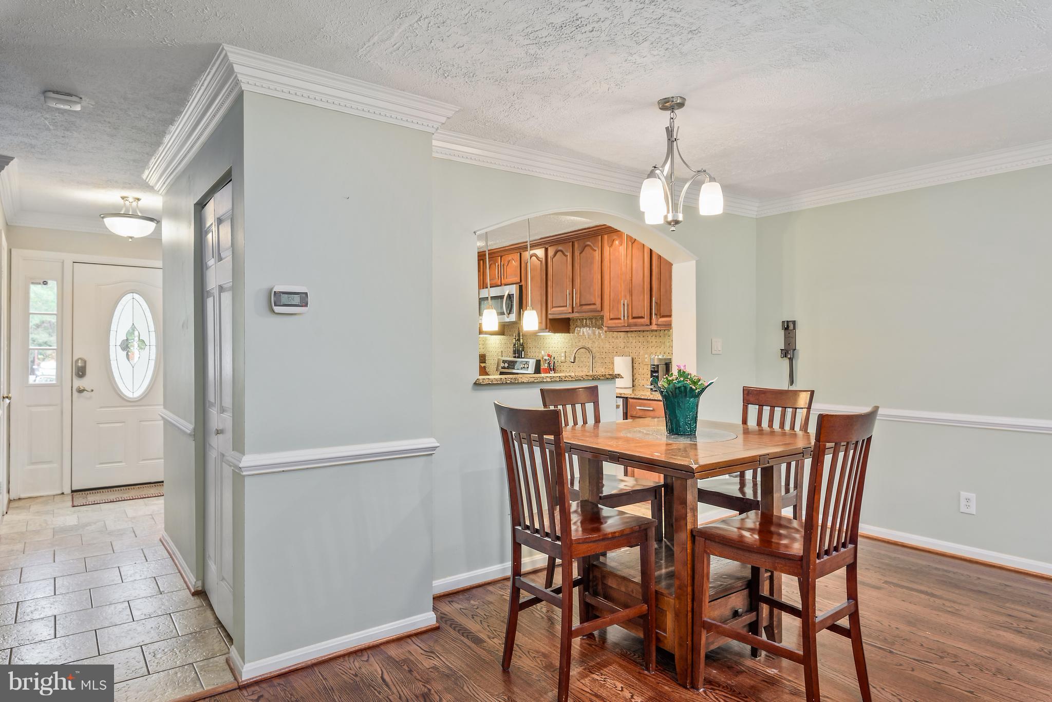 7305 Stream Way Springfield, VA 22152 - Photo 12 of 35 Dining Room with Hardwood Flooring