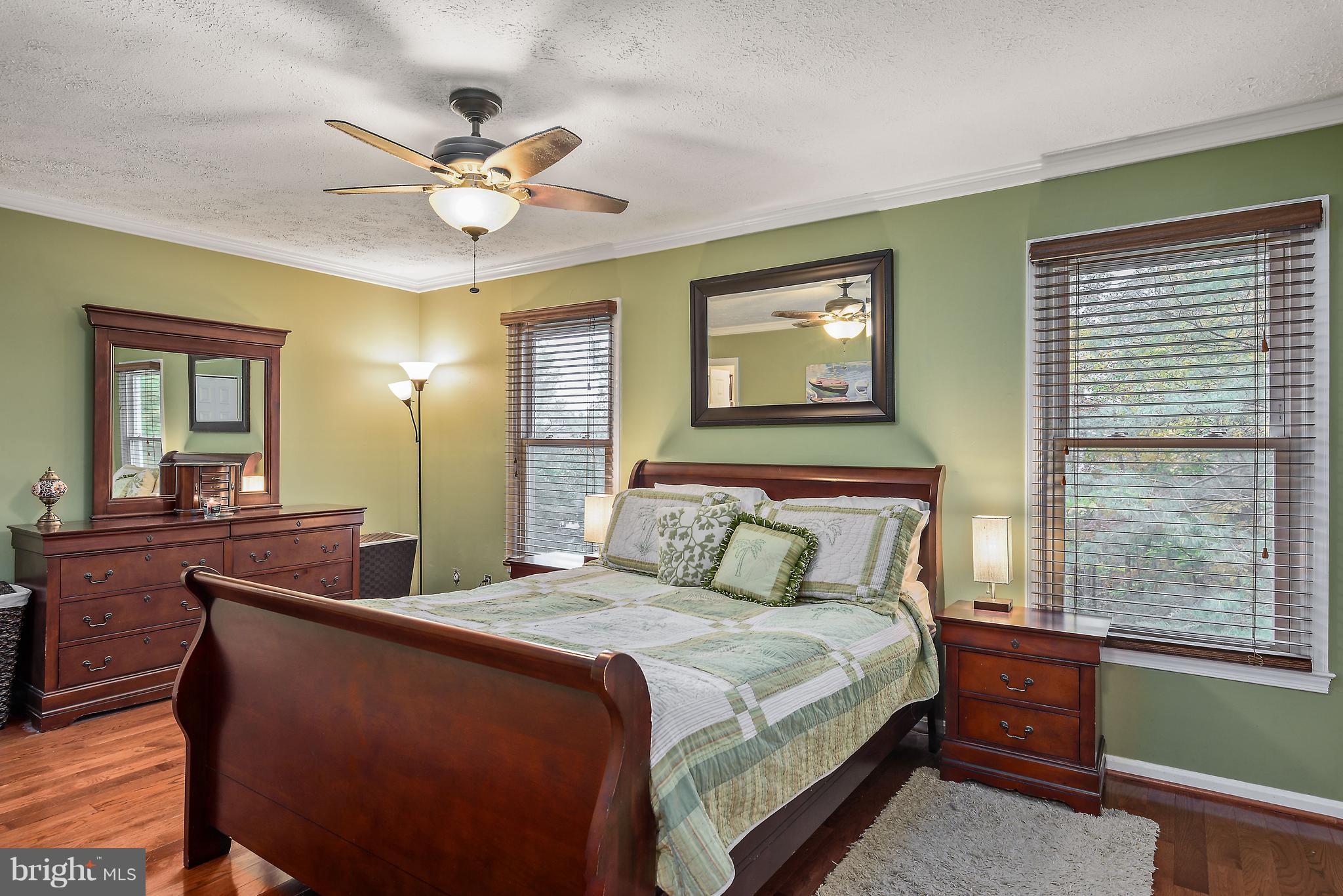 7305 Stream Way Springfield, VA 22152 - Photo 19 of 35 Master Bedroom with Hardwood Flooring
