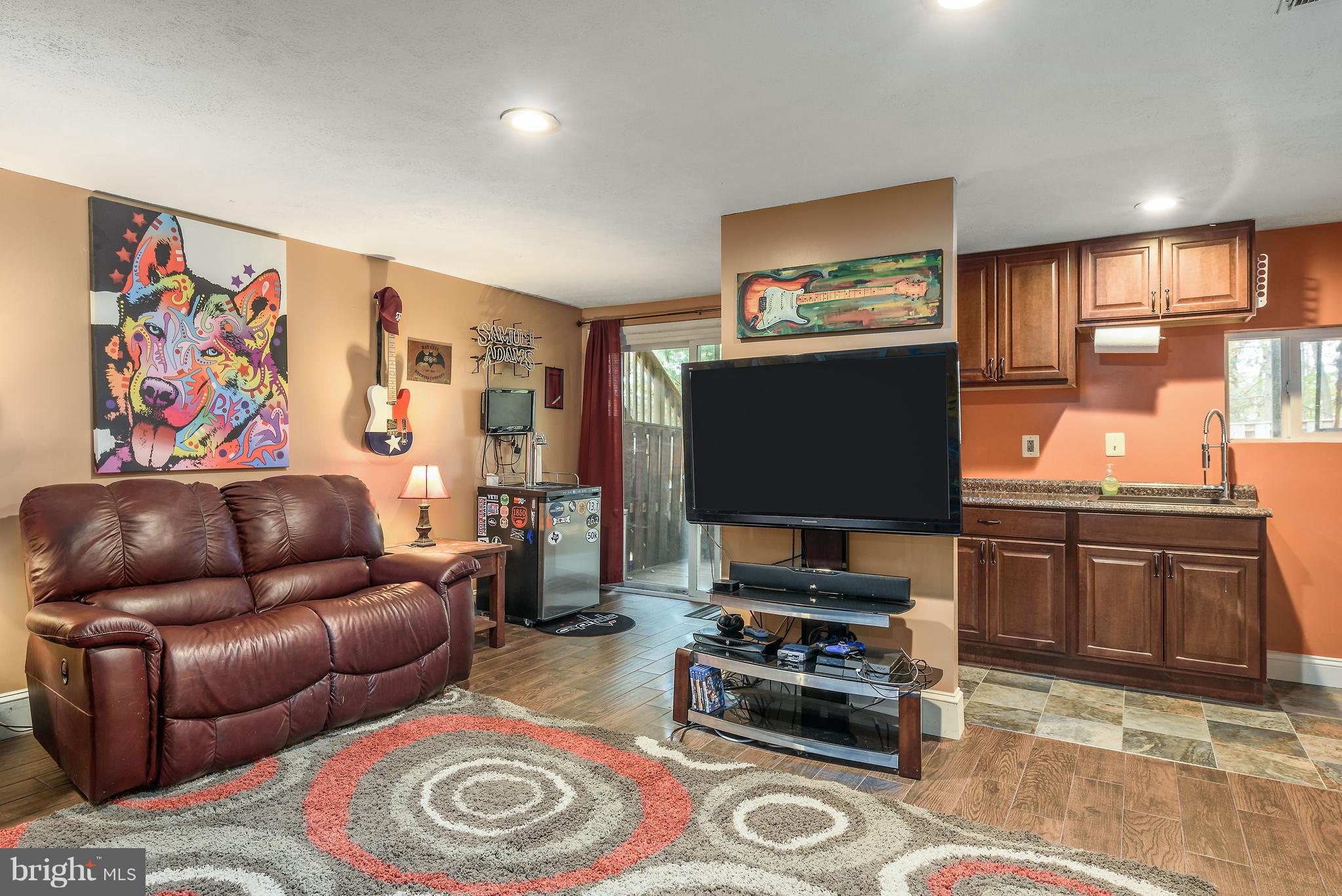 7305 Stream Way Springfield, VA 22152 - Photo 24 of 35 Rec Room with Wood Style Ceramic Tile Flooring