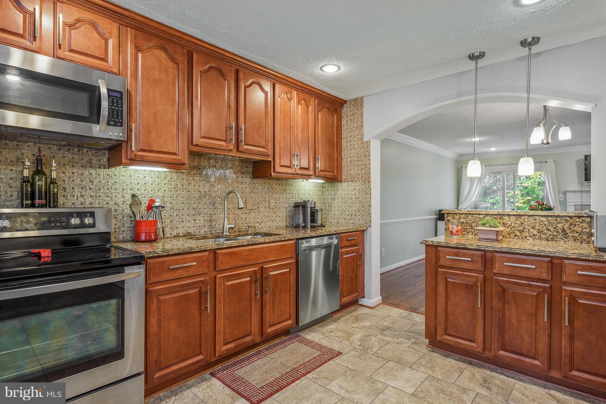 7305 Stream Way Springfield, VA 22152 - Photo 4 of 35 Gourmet Kitchen with Stainless Steel Appliances