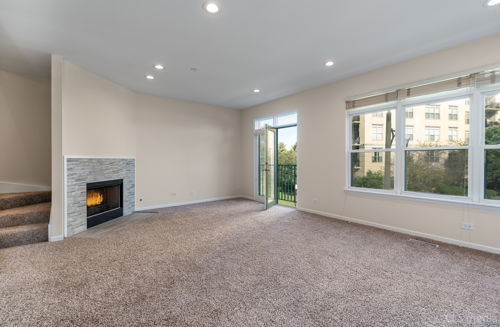 3540 Patten Road Highland Park, IL 60035 - Photo 14 of 30 a view of an empty room with a fireplace and a window