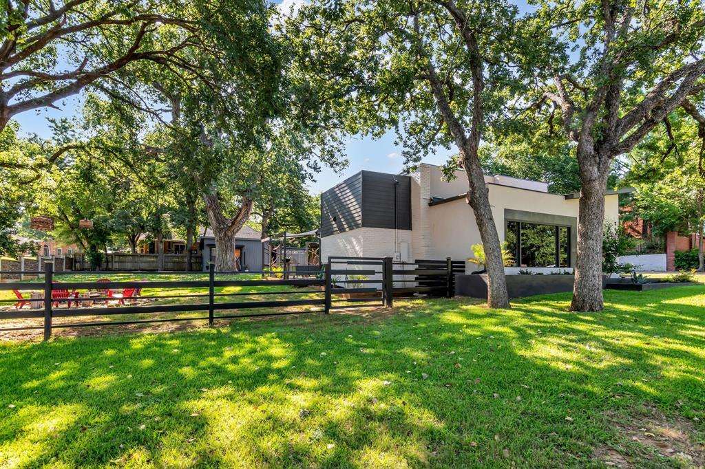 3449 West T Parr Road Grapevine, TX 76051 - Photo 4 of 32 a view of a house with backyard and sitting area