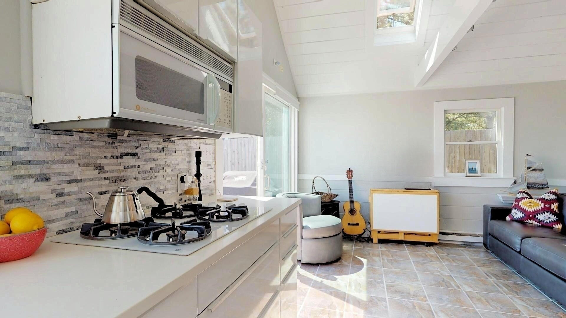 596 Shore Road, Unit H Truro, MA 02666 - Photo 11 of 30 a view of a living room and dining room