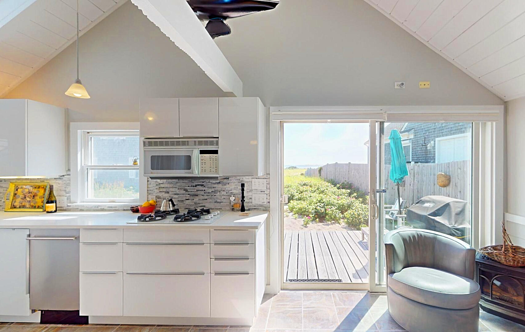 596 Shore Road, Unit H Truro, MA 02666 - Photo 12 of 30 a kitchen view of counter top space a sink and cabinets