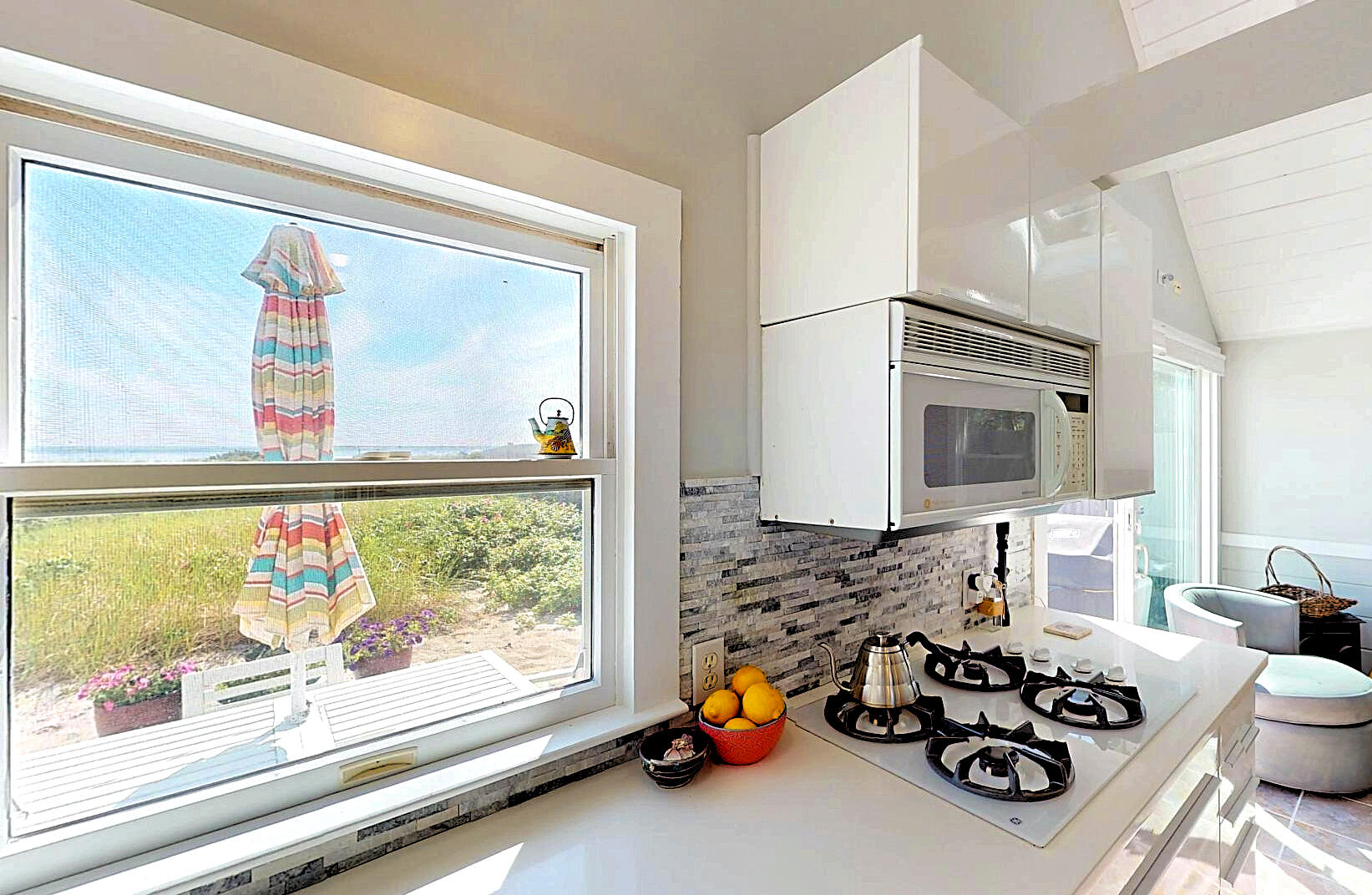 596 Shore Road, Unit H Truro, MA 02666 - Photo 14 of 30 a view of a living room and a window