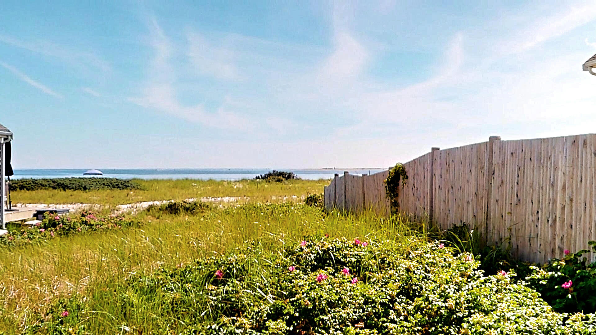 596 Shore Road, Unit H Truro, MA 02666 - Photo 29 of 30 a view of an ocean and a building