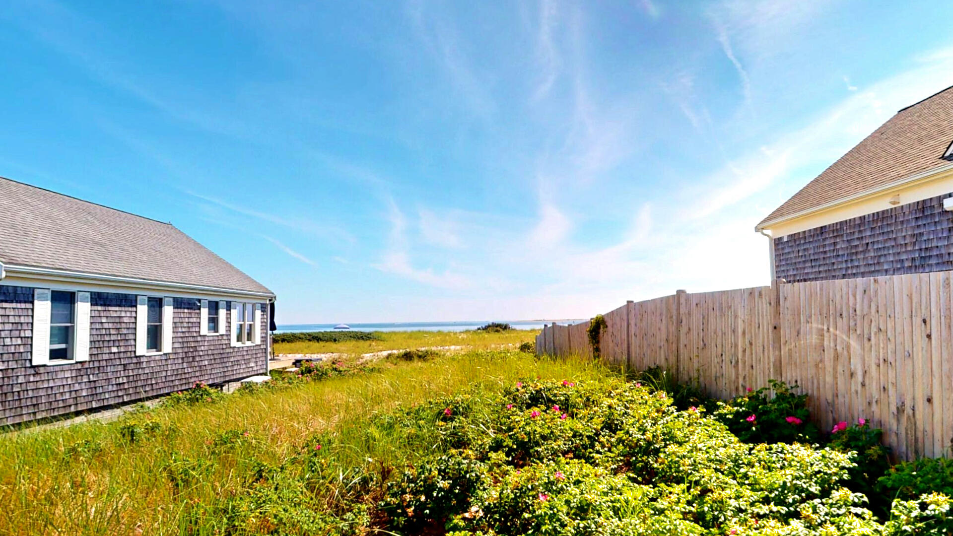 596 Shore Road, Unit H Truro, MA 02666 - Photo 4 of 30 a view of a house with a garden