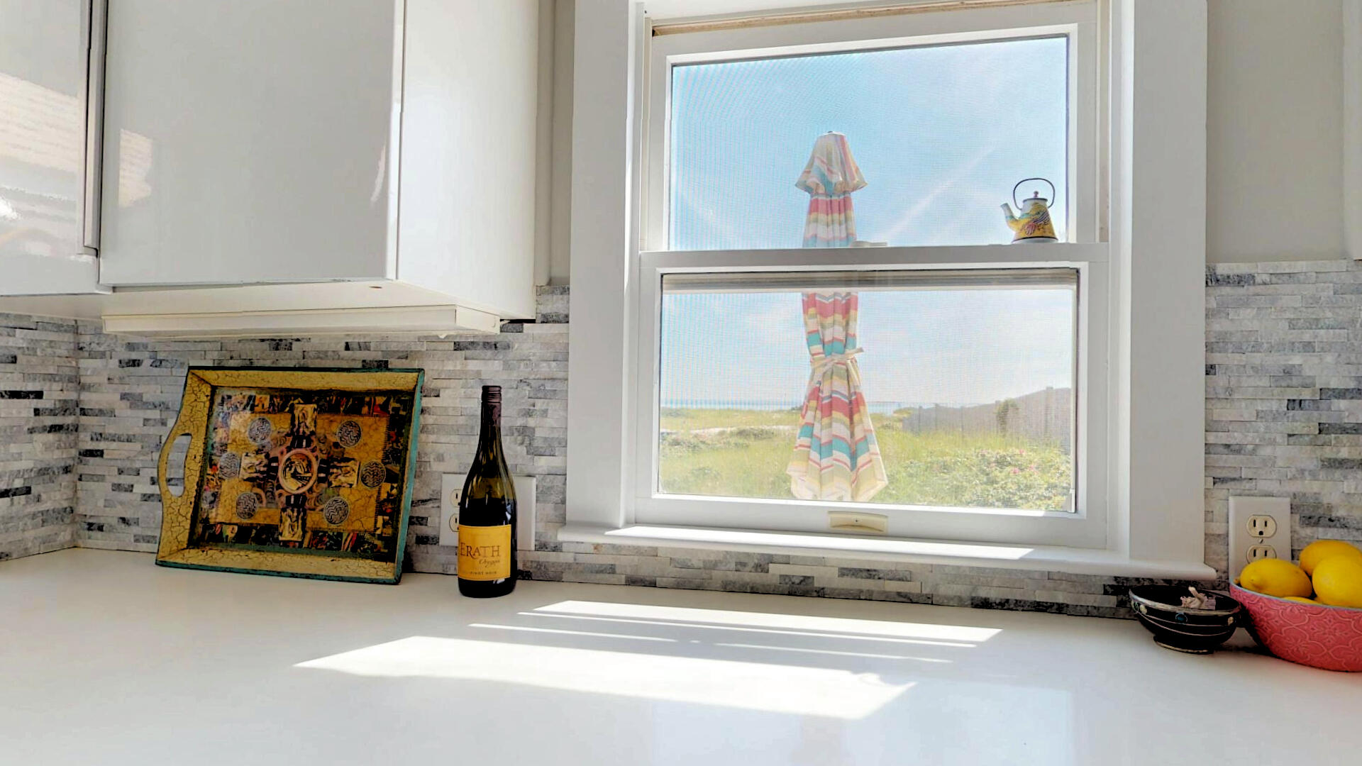 596 Shore Road, Unit H Truro, MA 02666 - Photo 8 of 30 a living room with furniture and a window
