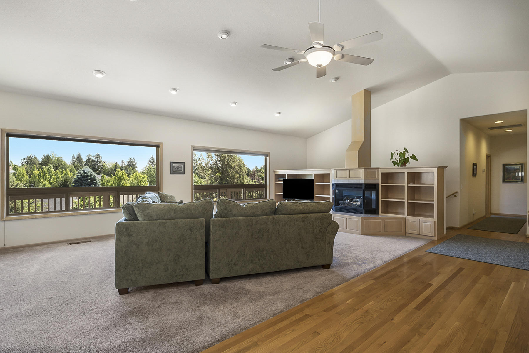 61524 Southeast Hill Ridge Road Bend, OR 97702 - Photo 9 of 49 Overlooking the spacious great room w/ vaulted ceilings from kitchen
