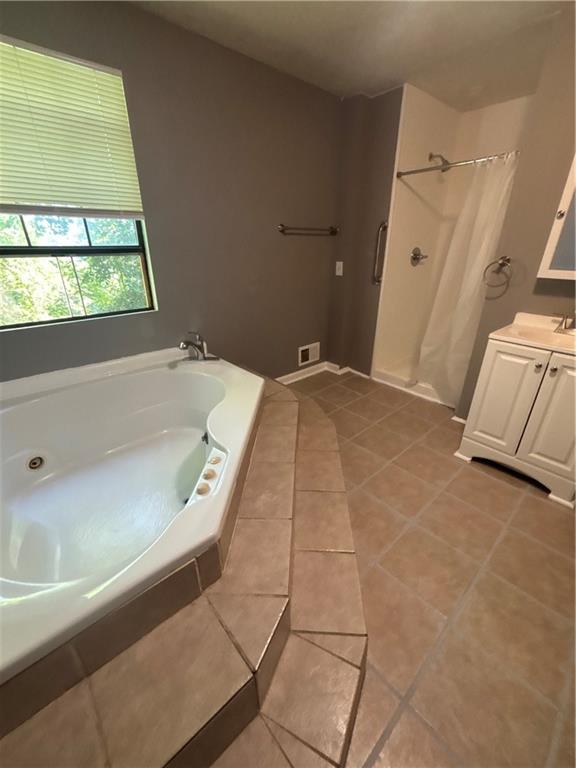 335 Cedarhurst Street Pittsburgh, PA 15210 - Photo 19 of 28 a bathroom with a tub sink and window