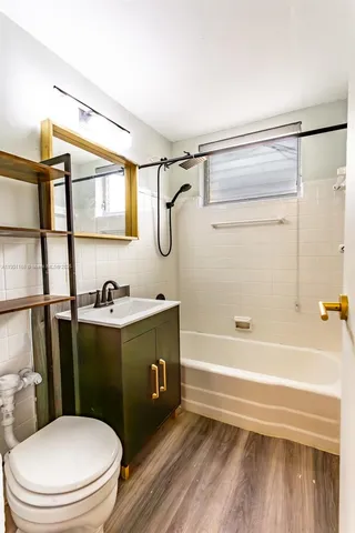 a bedroom with a bed and a cabinets