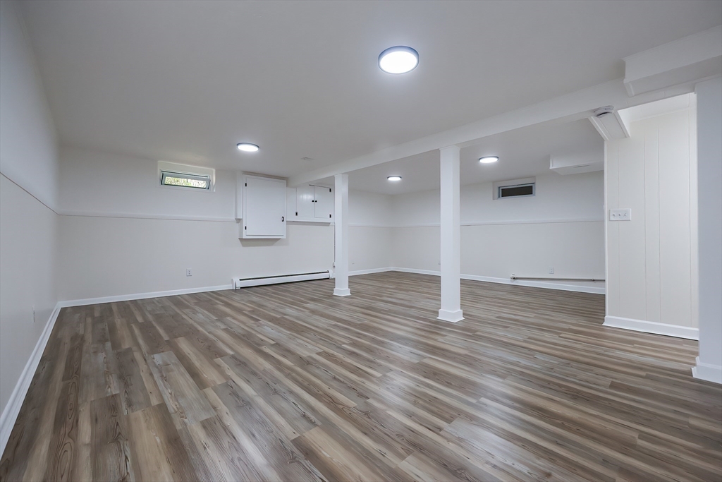 16 Deerfield Road Sharon, MA 02067 - Photo 23 of 38 a view of empty room with wooden floor
