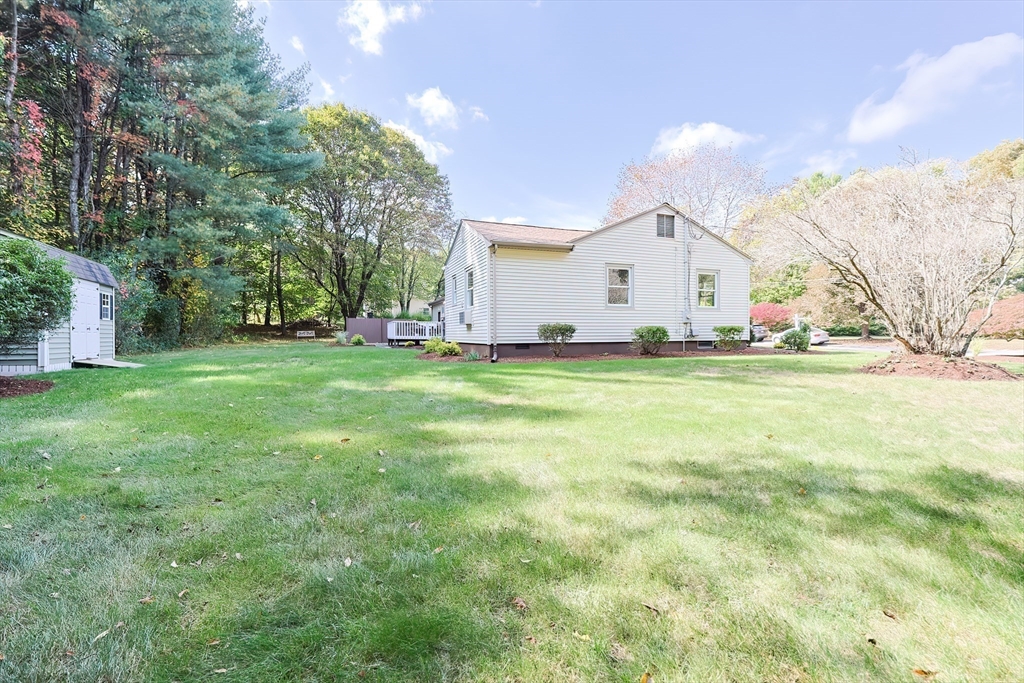 16 Deerfield Road Sharon, MA 02067 - Photo 28 of 38 a view of a house with a big yard and large trees