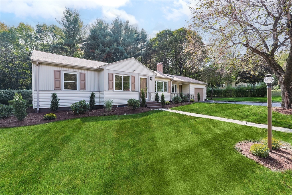 16 Deerfield Road Sharon, MA 02067 - Photo 3 of 38 a front view of house with yard and green space