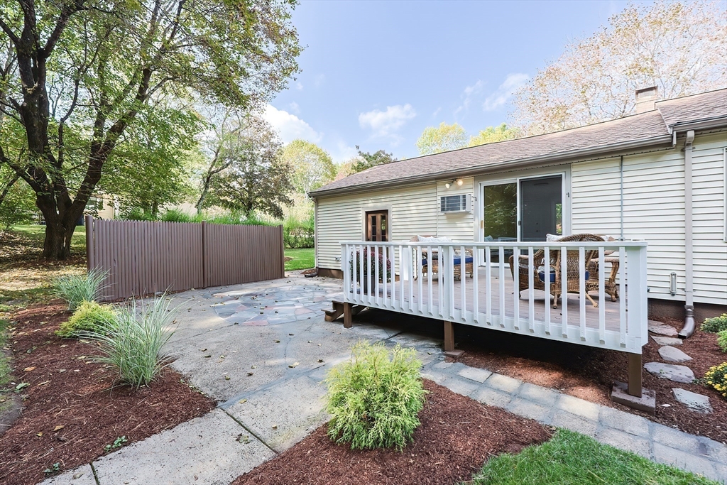16 Deerfield Road Sharon, MA 02067 - Photo 32 of 38 a view of a house with a backyard and deck