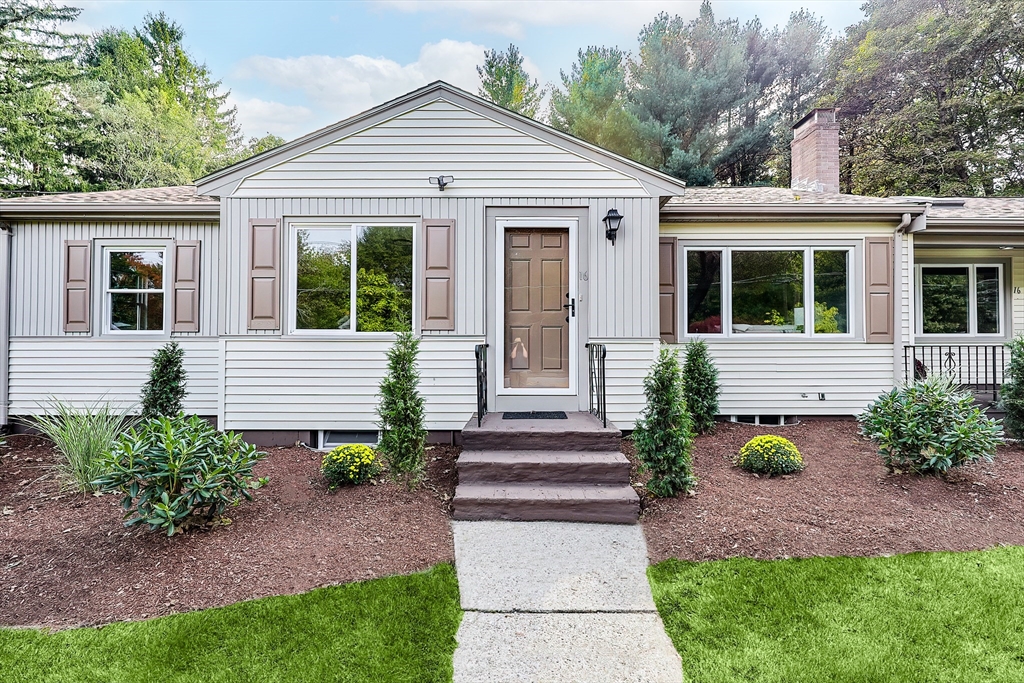 16 Deerfield Road Sharon, MA 02067 - Photo 35 of 38 a front view of a house with garden
