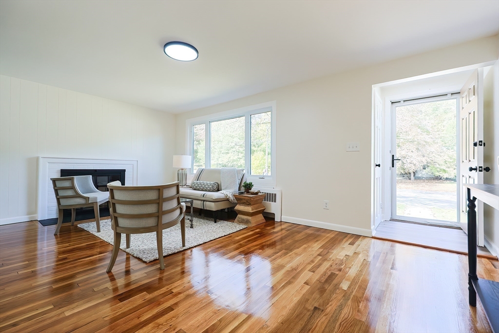 16 Deerfield Road Sharon, MA 02067 - Photo 8 of 38 a living room with furniture and a window