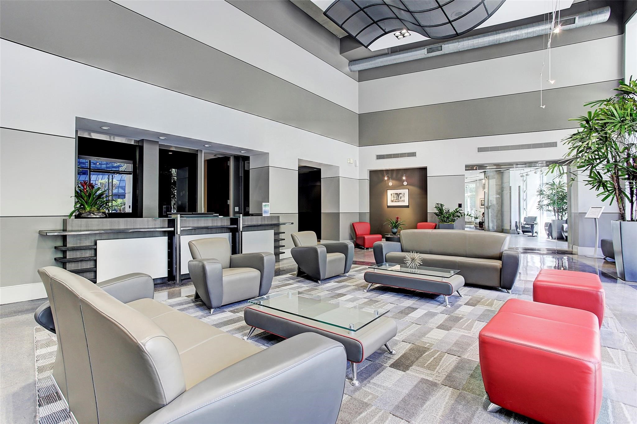 1901 Post Oak Boulevard, Unit 3502 Houston, TX 77056 - Photo 12 of 14 a living room with furniture and a potted plant